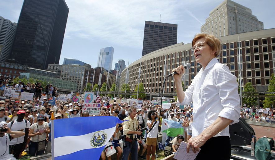 Sen. Elizabeth Warren, D-Mass., speaks during a Rally Against Separation Saturday, June 30, 2018, in Boston. (AP Photo/Winslow Townson)