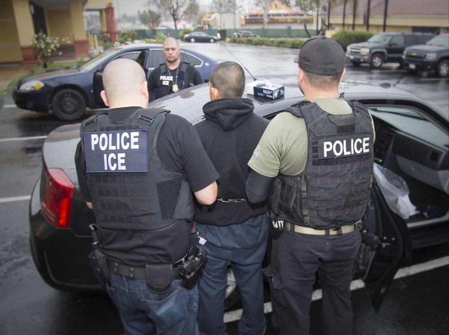 In this Tuesday, Feb. 7, 2017, photo released by U.S. Immigration and Customs Enforcement shows foreign nationals being arrested this week during a targeted enforcement operation conducted by U.S. Immigration and Customs Enforcement (ICE) aimed at immigration fugitives, re-entrants and at-large criminal aliens in Los Angeles. (Charles Reed/U.S. Immigration and Customs Enforcement via AP) ** FILE **