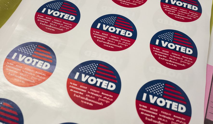 &quot;I Voted&quot; stickers wait for voters at a polling station inside the library at Robert F. Kennedy Elementary School in Los Angeles on Tuesday, June 5, 2018.   Voters are casting ballots in California&#39;s primary election, setting the stage for November races. (AP Photo/Richard Vogel)