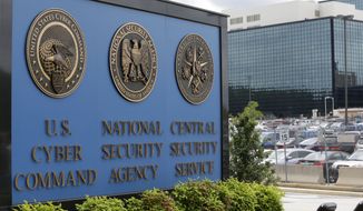 In this June 6, 2013, file photo, a sign stands outside the National Security Agency (NSA) campus in Fort Meade, Md. (AP Photo/Patrick Semansky, File)