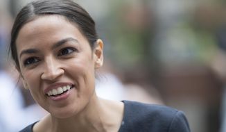 Socialist Alexandria Ocasio-Cortez, a 28-year-old former bartender from New York, is preaching free everything for everybody as she runs for a House seat. (Associated Press/File)