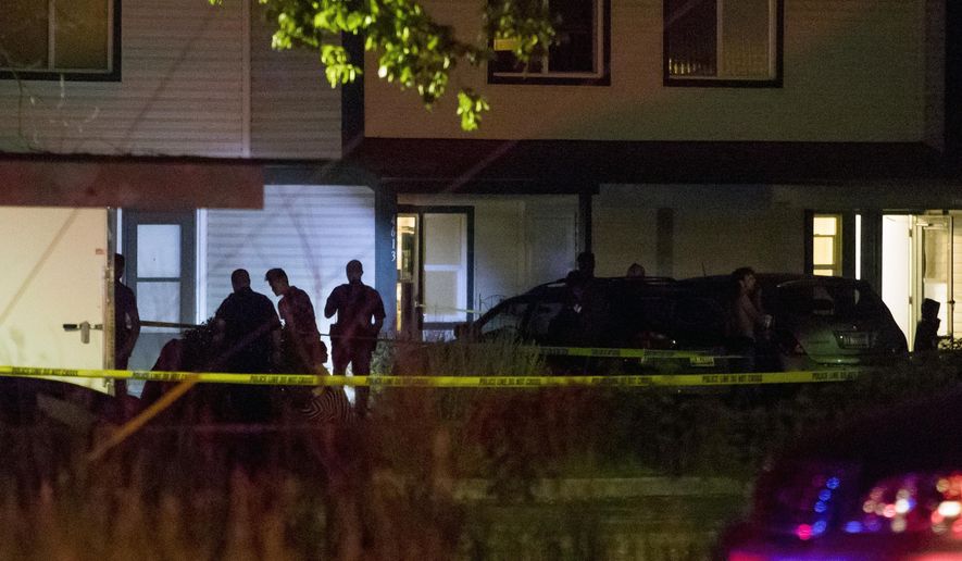 Boise police investigate at a crime scene near the corner of State and Wyle Streets in Boise just before 11:00 p.m. Saturday, June 30, 2018. During a news conference Police Chief Bill Bones reported that nine stabbing victims of diverse ages were reported at the scene. The call to police was made at 8:46 p.m. He said all nine victims were transported to the hospital and police apprehended a suspect at gunpoint soon after the incident. (Darin Oswald/Idaho Statesman via AP)