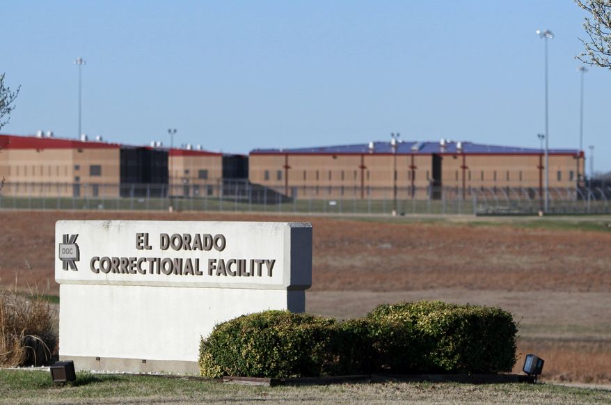 FILE - This March 23, 2011, file photo shows the El Dorado Correctional Facility near El Dorado, Kan. Officials say a group of inmates have surrendered after starting fires inside the prison during a disturbance Sunday, July 1, 2018. No injuries were reported. (AP Photo/Orlin Wagner, File)