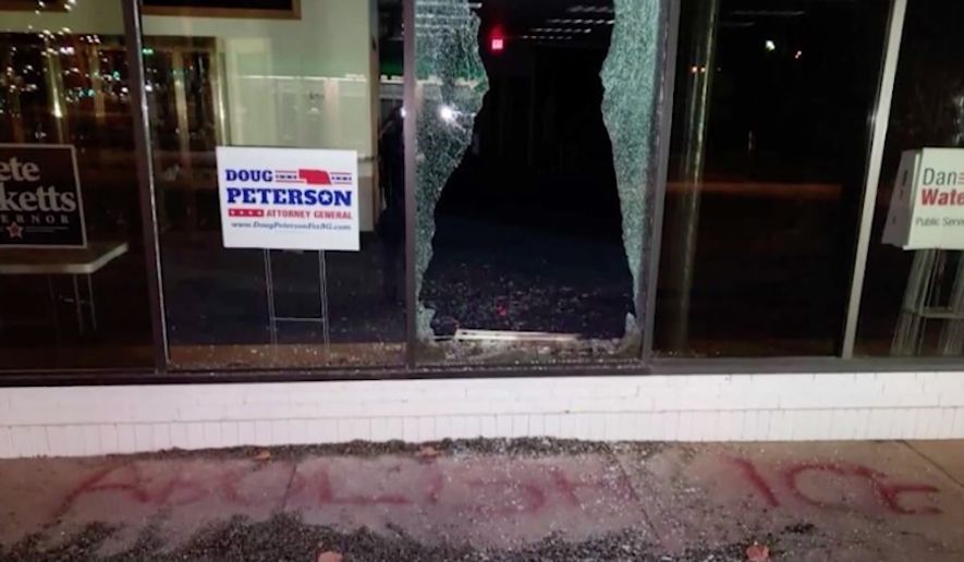 Vandals shattered a front window and spray-painted the words &quot;Abolish ICE&quot; at the statewide headquarters of the Nebraska Republican Party overnight Monday. (KETV 7)