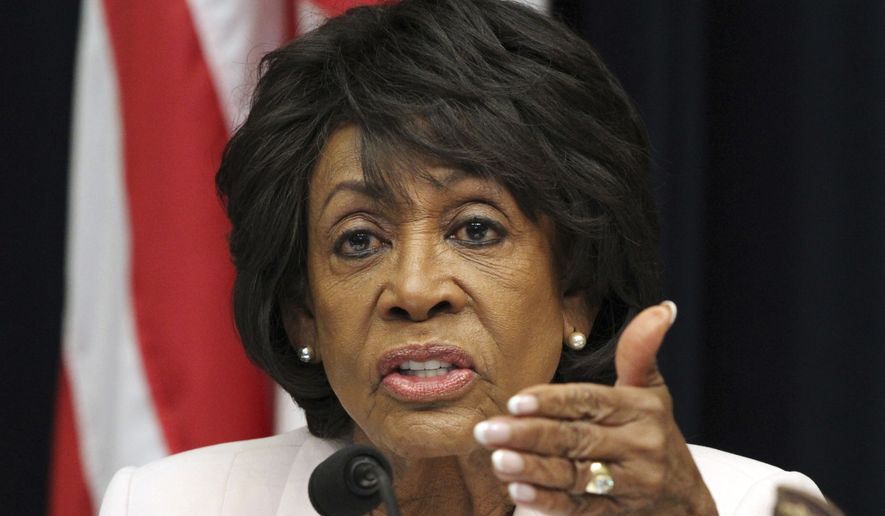 House Financial Services Committee ranking member Rep. Maxine Waters, D-Calif., asks a question of Housing and Urban Development Secretary Ben Carson, during a hearing Wednesday, June 27, 2018, on Capitol Hill in Washington. (AP Photo/Jacquelyn Martin)