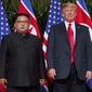 FILE - In this June. 12, 2018, file photo, U.S. President Donald Trump, right, stands with North Korean leader Kim Jong Un during a meeting on Sentosa Island, in Singapore. Diplomacy aimed at ending the North Korean nuclear crisis has produced little tangible progress since the historic June 12 summit between Trump and Kim. (AP Photo/Evan Vucci, File)