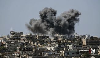 This Thursday, July 5, 2018 photo provided by Nabaa Media, a Syrian opposition media outlet, shows smoke rising over buildings that were hit by Syrian government forces bombardment, in Daraa province, southern Syria. Syrian state media and a war monitor say government forces have captured new areas along the border with Jordan and are on the verge of reaching a main crossing between the two countries. (Nabaa Media, via AP)