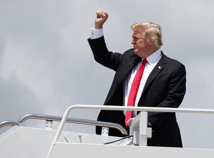 President Donald Trump boards Air Force One, Thursday, July 5, 2018, at Andrews Air Force Base, Md., en route to a rally in Great Falls, Mont. (AP Photo/Carolyn Kaster) ** FILE **