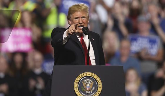 President Donald Trump addresses the audience at a rally at the Four Seasons Arena at Montana ExpoPark, Thursday, July 5, 2018, in Great Falls, Mont., in support of Rep. Greg Gianforte, R-Mont., and GOP Senate candidate Matt Rosendale. (AP Photo/Jim Urquhart)