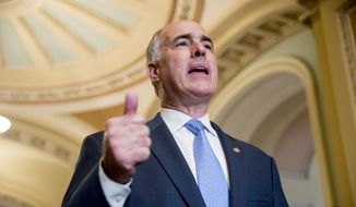 Sen. Bob Casey, Jr., D-Pa., speaks with reporters following a closed door policy luncheon on Capitol Hill in Washington, Tuesday, June 26, 2018. (AP Photo/Andrew Harnik)