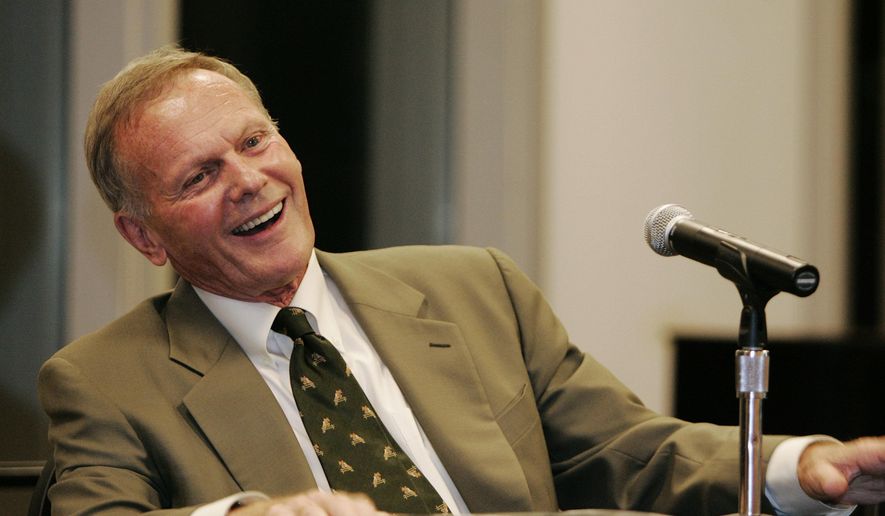 In this Oct. 14, 2005, file photo, Hollywood icon Tab Hunter answers questions from the crowd during a book signing in New York for his memoir, "Tab Hunter Confidential: The Making of a Movie Star." Hunter, the blond actor and singer who was the heartthrob of millions of teenage girls in the 1950s, and received new attention decades later when he revealed that he was gay, has died. He was 86. (AP Photo/Julie Jacobson, File)