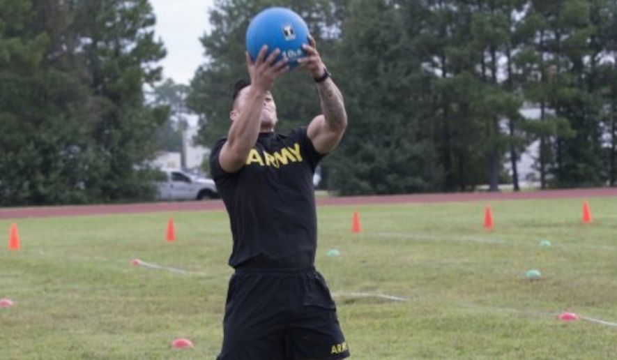 The U.S. Army will roll out its new fitness test by 2020. This image shows Staff Sgt. Joel Demillo performing the standing power throw event during a pilot for the Army Combat Fitness Test. (Image: U.S. Army)