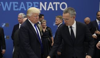 In this Thursday, May 25, 2017, file photo, U.S. President Donald Trump, left, and NATO Secretary General Jens Stoltenberg take a seat during a working dinner at a NATO summit in Brussels. When Donald Trump walks into a NATO summit Wednesday, July 11, 2018,  international politics are bound to become intensely personal _ again. (AP Photo/Matt Dunham, Pool, File)