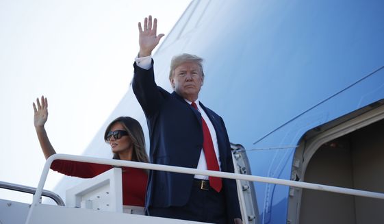President Donald Trump and first lady Melania Trump board Air Force One, Tuesday, July 10, 2018, at Andrew Air Force Base, Md. Trump is traveling on a weeklong trip to Europe on a four-nation tour, with stops in Belgium, England, Scotland and Finland. (AP Photo/Pablo Martinez Monsivais)