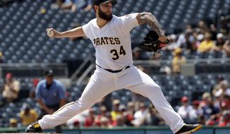 Pittsburgh Pirates starting pitcher Trevor Williams delivers in the first inning of a baseball game against the Washington Nationals in Pittsburgh, Wednesday, July 11, 2018. (AP Photo/Gene J. Puskar)