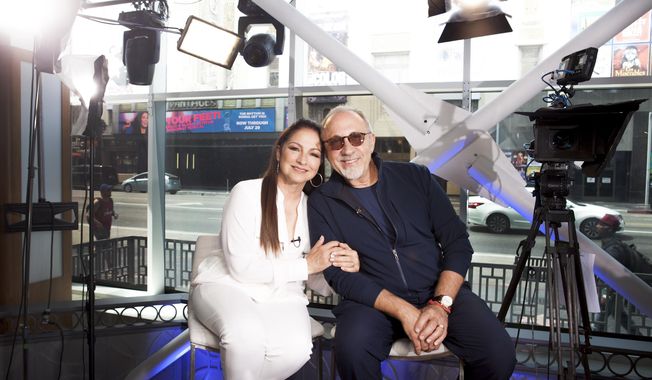 In this July 9, 2018 photo, Gloria and Emilio Estefan pose for a portrait at BiteSize Studio in Los Angeles to promote their touring musical &amp;quot;On Your Feet!.&amp;quot;  (Photo by Rebecca Cabage/Invision/AP)