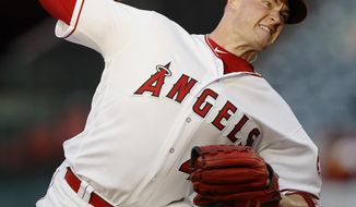 Los Angeles Angels starting pitcher Garrett Richards delivers against an Seattle Mariners batter during the first inning of a baseball game in Anaheim, Calif., Tuesday, July 10, 2018. (AP Photo/Alex Gallardo)