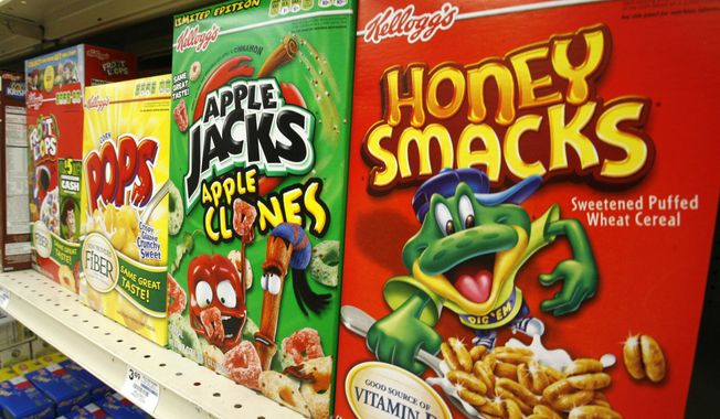 Hold for Business Photo: Boxes of Kellogg&#x27;s Froot Loops, Corn Pops, Apple Jacks, and Honey Smacks sit on the shelf of a Mt. Lebanon, Pa., grocery store Friday, June 25, 2010. (AP Photo/Gene J. Puskar)
