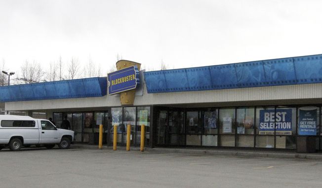 FILE - This May 2, 2018 file photo shows the exterior of a Blockbuster Video store in Anchorage, Alaska. Despite the gift of the jockstrap worn by actor Russell Crowe in the 2005 movie "Cinderella Man" from HBO's John Oliver to bring traffic into the store, Blockbuster Alaska General Manager Kevin Daymude said the last two Blockbuster Video locations in Alaska will rent their last video on Sunday, July 15, 2018, apparently leaving the last Blockbuster Video in Bend, Ore. (AP Photo/Mark Thiessen, File)