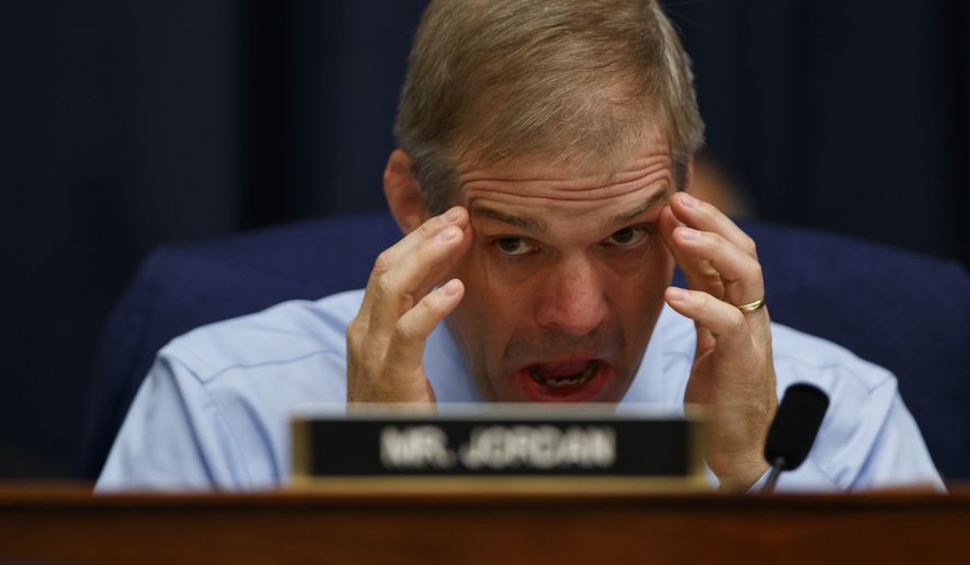 Rep. Jim Jordan, R-Ohio, listens to FBI Deputy Assistant Director Peter Strzok testify before the House Committees on the Judiciary and Oversight and Government Reform during a hearing on 