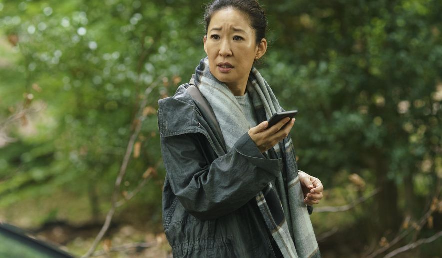 This image released by BBC America shows Sandra Oh in a scene from "Killing Eve." Oh was nominated Thursday for an Emmy for outstanding lead actress in a drama series. The 70th Emmy Awards will be held on Monday, Sept. 17. (BBC America via AP)