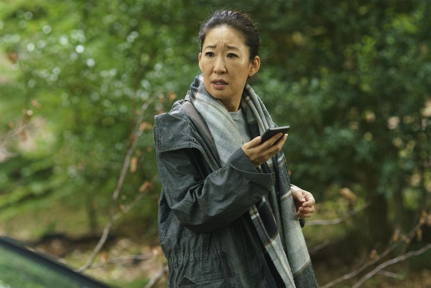 This image released by BBC America shows Sandra Oh in a scene from "Killing Eve." Oh was nominated Thursday for an Emmy for outstanding lead actress in a drama series. The 70th Emmy Awards will be held on Monday, Sept. 17. (BBC America via AP)