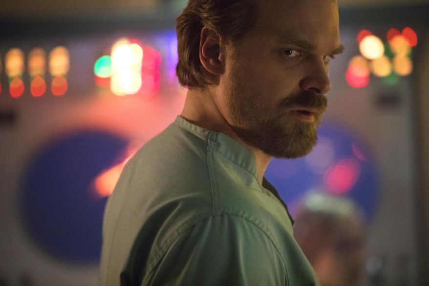 This image released by Netflix shows David Harbour in a scene from &quot;Stranger Things 2.&quot; (Netflix via AP) **FILE**