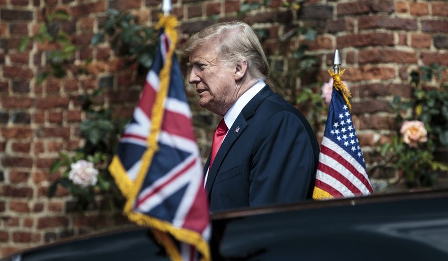 U.S President Donald Trump arrives to meet British Prime Minister Theresa May before their meeting at Chequers, in Buckinghamshire, England, Friday, July 13, 2018. (Jack Taylor/Pool Photo via AP)