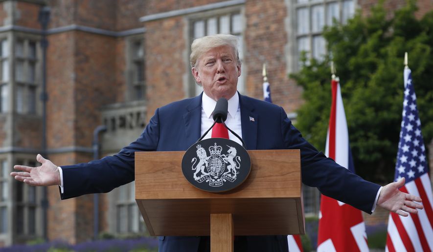 President Donald Trump gestures while speaking during a joint news conference with British Prime Minister Theresa May at Chequers, in Buckinghamshire, England, Friday, July 13, 2018. (AP Photo/Pablo Martinez Monsivais)
