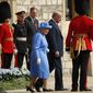 Queen Elizabeth II and President Donald Trump walk together to inspect the Guard of Honour at Windsor Castle in Windsor, England. (AP Photo/Pablo Martinez Monsivais)