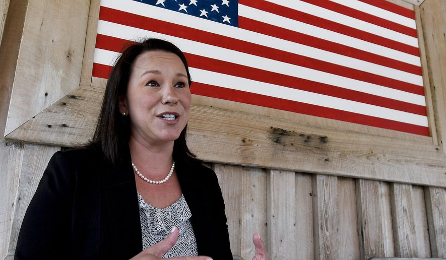 U.S. Rep. Martha Roby, of Alabama, campaigns at a fish fry in Andalusia, Ala. Roby drew a backlash for criticizing Donald Trump two years ago. Now shes trying to fend off primary challenger Bobby Bright with Trumps help, in the July 17 runoff. Bright represented the district for two years as a Democrat, but is running as a Republican and charges Roby with not being sufficiently conservative. (Mickey Welsh/The Montgomery Advertiser via AP, File)