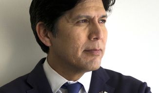 FILE - In this May 3, 2018 file photo, California state Senate President pro Tempore Kevin de Leon, D-Los Angeles, poses for photos in his campaign office in Los Angeles. The California Democratic Party has snubbed U.S. Sen. Dianne Feinstein by giving its endorsement to her rival, de Leon. He won the party nod Saturday, July 14 after a vote of the party&#39;s roughly 360-member executive board made up of local officials and party activists.  (AP Photo/Jae C. Hong, File)