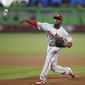Philadelphia Phillies starting pitcher Enyel De Los Santos delivers during the first inning of a baseball game against the Miami Marlins, Sunday, July 15, 2018, in Miami. (AP Photo/Brynn Anderson)