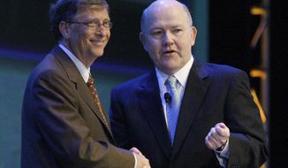 FILE - In this June 29, 2010 file photo, Microsoft founder Bill Gates, left, shakes hands with Nelson Smith, who at the time was President and CEO of the National Alliance for Public Charter Schools, during the National Charter Schools Conference in Chicago. All told, the Bill and Melinda Gates Foundation has given about $25 million to the Washington State Charter Schools Association, and since 2006, philanthropists and their private foundations and charities have given almost half a billion dollars to similar groups, according to an Associated Press analysis of tax filings and Foundation Center data. (AP Photo/Kiichiro Sato, file)