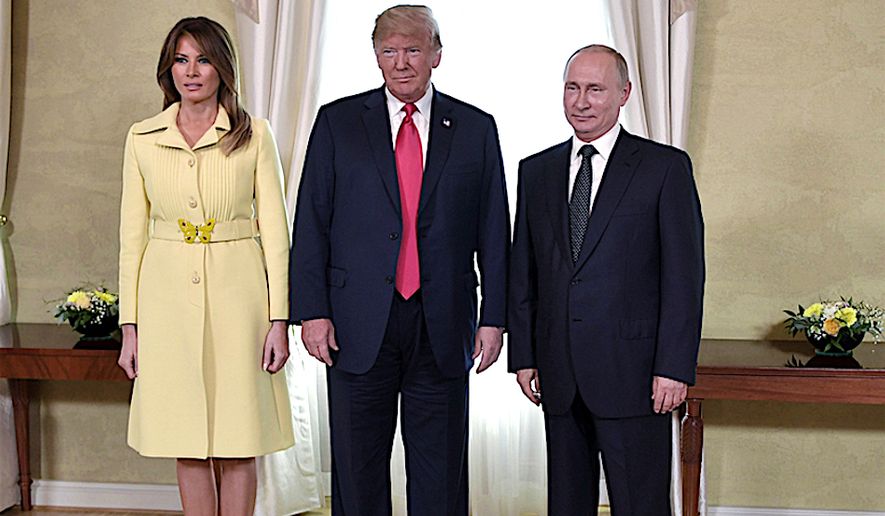 First Lady Melania Trump, President Trump and Russian President Vladimir Putin, pose for a photograph in Helsinki, Finland, just prior to the much awaited summit between the two leaders on Monday. (Alexei Nikolsky, Sputnik, Kremlin Pool Photo via AP)
