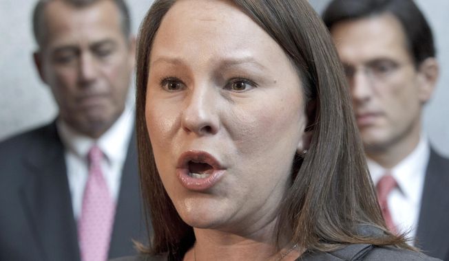 In this Jan. 24, 2012, file photo, Rep. Martha Roby, R-Ala., speaks to reporters on Capitol Hill in Washington, following a GOP strategy session. (AP Photo/J. Scott Applewhite, File)