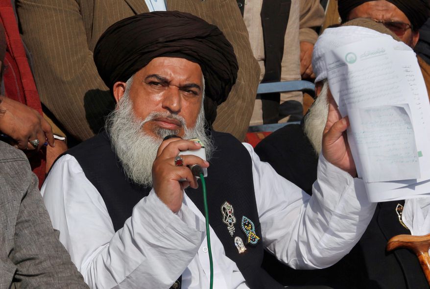 Head of the radical religious party, Tehreek-i-Labaik Ya Rasool Allah, Khadim Hussain Rizvi speaks during a press conference regarding their talks with government to end the sit-in protest in Islamabad, Pakistan, Monday, Nov. 27, 2017. Pakistani Islamists announced they were disbanding their sit-in near Islamabad after the country&#39;s law minister resigned, caving in to the protesters who have been demanding his ouster in a three-week-long rally. (AP Photo/Anjum Naveed)