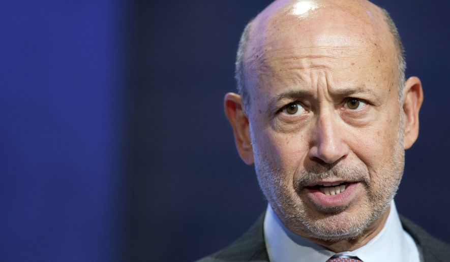 In this Sept. 24, 2014, file photo, Lloyd Blankfein, chairman and CEO of Goldman Sachs, speaks during a panel discussion at the Clinton Global Initiative, in New York. Goldman Sachs announced Tuesday, July 17, 2018, that Blankfein will retire as CEO and chairman on Sept. 30, and be replaced by Chief Operating Officer David Solomon. (AP Photo/Mark Lennihan, File)