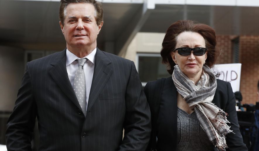 FILE - In this March 8, 2018, file photo, Paul Manafort, left, President Donald Trump's former campaign chairman, walks with this wife Kathleen Manafort, as they arrive at the Alexandria Federal Courthouse in Alexandria, Va. Special counsel Robert Mueller is seeking immunity for five potential witnesses in the upcoming trial of Manafort. Mueller's office told a federal judge in Virginia on July 17 that they were seeking to compel the witnesses to testify under condition of immunity. Prosecutors said the witnesses have indicated they won't testify "on the basis of their privilege against self-incrimination." Prosecutors say that if they do testify, they are requesting "use immunity." That means the government couldn't use their statements against them. (AP Photo/Jacquelyn Martin, File)