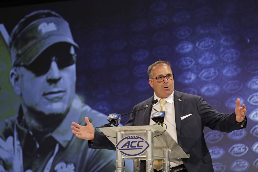 Pittsburgh head coach Pat Narduzzi answers a question during a news conference at the NCAA Atlantic Coast Conference college football media day in Charlotte, N.C., Wednesday, July 18, 2018. (AP Photo/Chuck Burton)