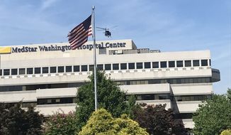 Police were investigating to see if there was an active shooter at MedStar Washington Hospital Center on Thursday, July 19, 2018. (The Washington Times/Adam Sabes