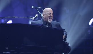 Musician Billy Joel performs during his 100th lifetime performance at Madison Square Garden on Wednesday, July 18, 2018, in New York. (Photo by Evan Agostini/Invision/AP)