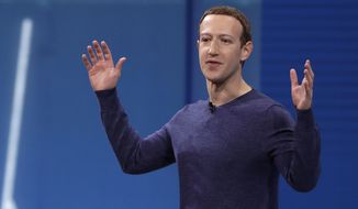 FILE - In this May 1, 2018, file photo, Facebook CEO Mark Zuckerberg makes the keynote address at F8, Facebook&#39;s developer conference in San Jose, Calif. Remarks from Zuckerberg have sparked criticism from groups such as the Anti-Defamation League. Zuckerberg, who is Jewish, told Recode&#39;s Kara Swisher in an interview that although he finds Holocaust denial &amp;quot;deeply offensive,&amp;quot; such content should not be banned from Facebook. (AP Photo/Marcio Jose Sanchez, File)