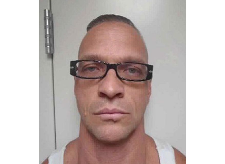 FILE - This undated file photo provided by Nevada Department of Corrections photo shows death row inmate Scott Raymond Dozier, who was convicted in 2007 of robbing, killing and dismembering a 22-year-old man in Las Vegas, and was convicted in Arizona in 2005 of another murder and dismemberment near Phoenix. Nevada has been trying for a year to execute Dozier, who says he wants to die and doesn't really care whether it's painful, and has twice been told it can't employ a never-before-used combinations of drugs for his lethal injection, including the first-ever use by a state of fentanyl. (Nevada Department of Corrections via AP, File)