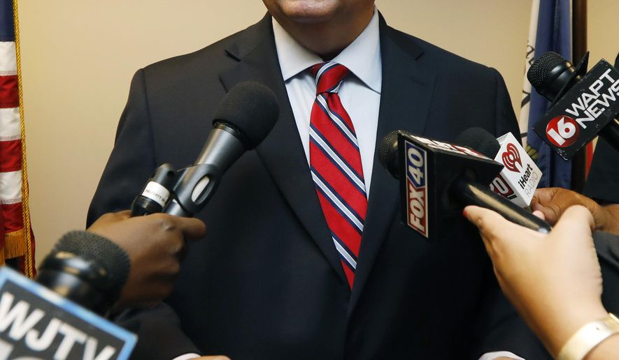 Mississippi Attorney General Jim Hood tells reporters, he has sent letters to more than 50 state officials asking them to preserve any records they might have related to a planned frontage road off Lakeland Drive from Lt. Gov. Tate Reeves' neighborhood to a nearby traffic light at a shopping center in Flowood, Thursday, July 19, 2018, following an unrelated news conference in Jackson, Miss. (AP Photo/Rogelio V. Solis)