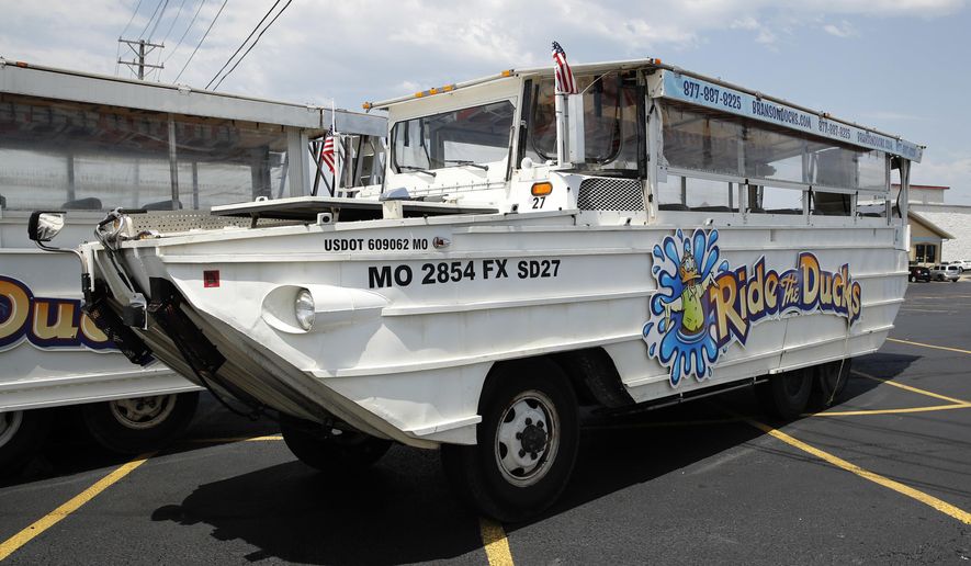 A duck boat sits idle in the parking lot of Ride the Ducks, an amphibious tour operator in Branson, Mo. Friday, July 20, 2018. The amphibious vehicle is similar to one of the company&#x27;s boats that capsized the day before on Table Rock Lake resulting in 17 deaths. (AP Photo/Charlie Riedel)