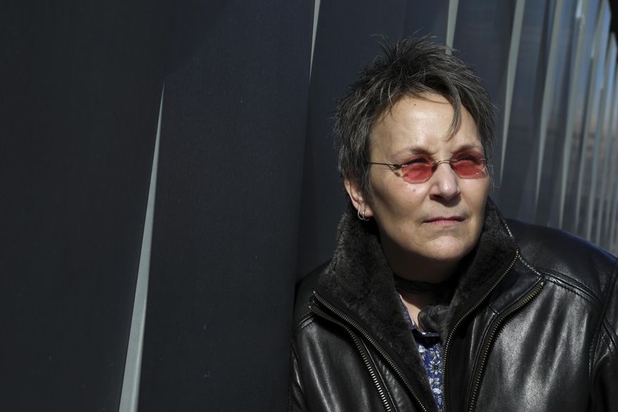 In this Feb. 8, 2018 photo, musician Mary Gauthier poses for a portrait in New York to promote her veteran inspired record "Rifles & Rosary Beads." (Photo by Amy Sussman/Invision/AP)