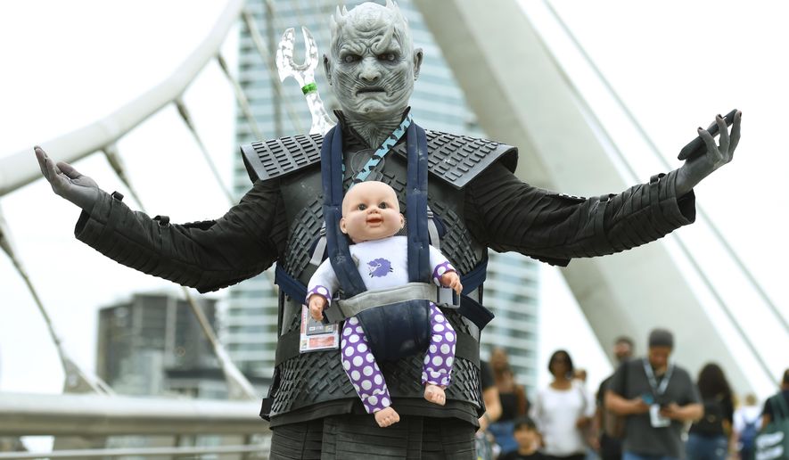 Ramsey Tugoz of Long Beach, Calif., dressed as the Night King from "Game of Thrones," attends Comic-Con International on Friday, July 20, 2018, in San Diego. (Photo by Chris Pizzello/Invision/AP)