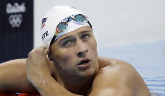 FILE - In this Tuesday, Aug. 9, 2016, file photo, United States&#39; Ryan Lochte checks his time in a men&#39;s 4x200-meter freestyle heat at the 2016 Summer Olympics, in Rio de Janeiro, Brazil. Lochte has been suspended until July 2019 by the U.S. Anti-Doping Agency. The 12-time Olympic medalist has been sanctioned for getting an intravenous infusion, a method that broke anti-doping rules. U.S. officials say Lochte was not using a banned substance. But under anti-doping rules, athletes typically cannot receive IVs unless related to a hospitalization or through an exemption. Lochte posted a photo of himself getting the IV in May and that image prompted the investigation. He was entered in four events at the national championships that start Wednesday, July 25, 2018, in California. (AP Photo/Michael Sohn, File) **FILE**