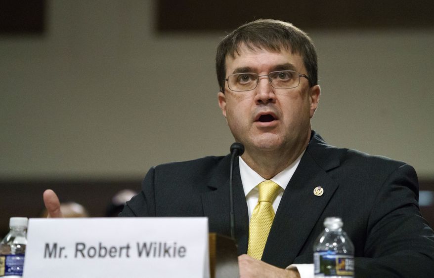 FILE - In this June 27, 2018, file photo, Robert Wilkie testifies during a Senate Veterans Affairs Committee nominations hearing on Capitol Hill in Washington. The Senate confirmed Wilkie to head the VA on July 23, 2018. (AP Photo/Carolyn Kaster, File)